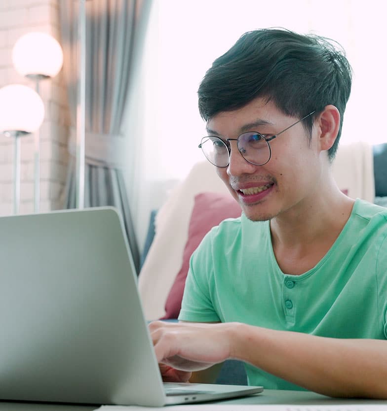 Teen boy on laptop computer in virtual IOP session